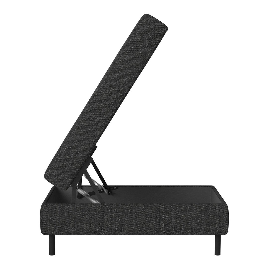 Black upholstered lift-top storage ottoman with a textured fabric finish. Modern design and versatile style.