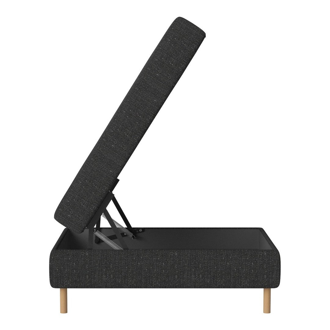Modern gray upholstered ottoman with a textured pattern and natural wood legs, showcasing a stylish lift-top design.