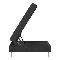 Modern gray upholstered ottoman with a textured pattern and natural wood legs, showcasing a stylish lift-top design.