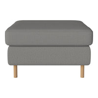Gray upholstered ottoman with a smooth texture and light wooden legs. Perfect for modern living spaces.