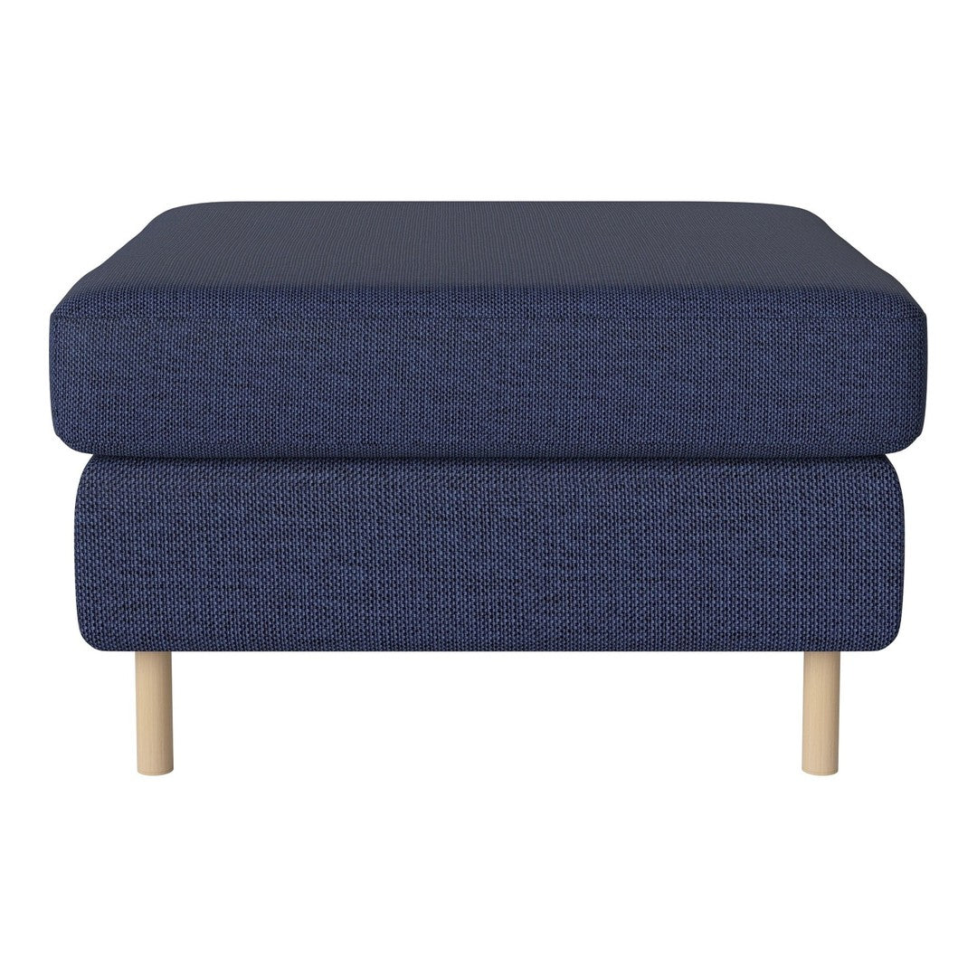 Navy blue upholstered ottoman with a textured pattern and light wood legs. Stylish and modern accessory for any space.