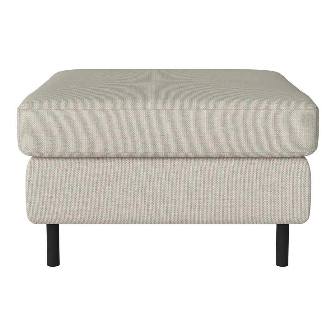 Light beige upholstered ottoman with a smooth texture and minimalist design. Black metal feet add contrast.