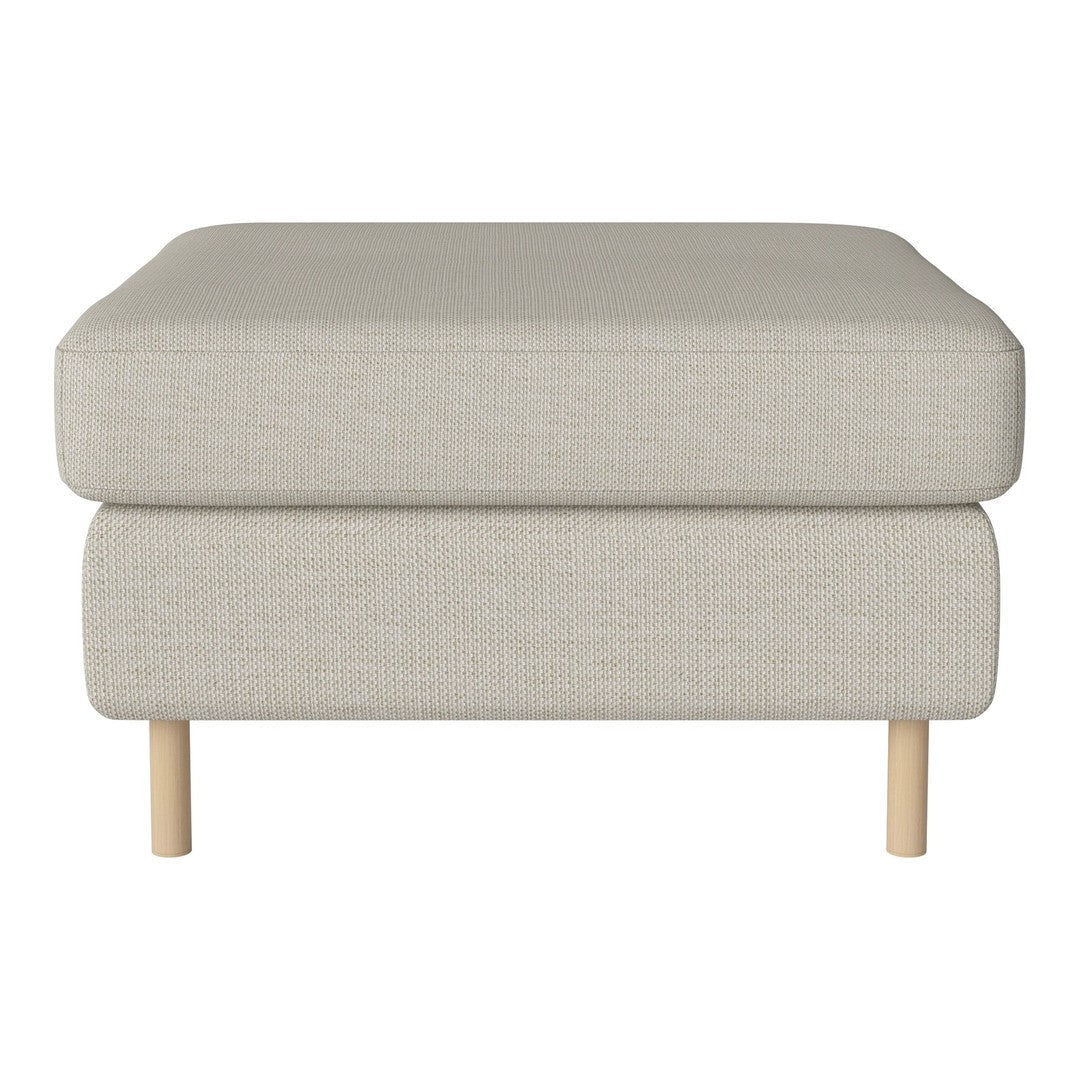 Light beige upholstered ottoman with a textured fabric and natural wooden legs. Simple, modern design.