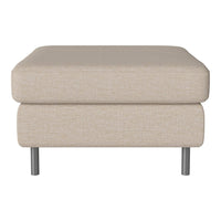 Beige fabric ottoman with a textured pattern and sleek metal legs, perfect for modern living spaces.