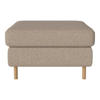 Beige textured ottoman with light wooden legs. Minimalist design, perfect for versatile home decor styles.