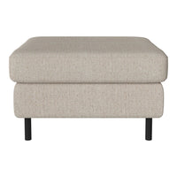 Light beige ottoman with a subtle textured pattern, featuring black legs for a modern touch.