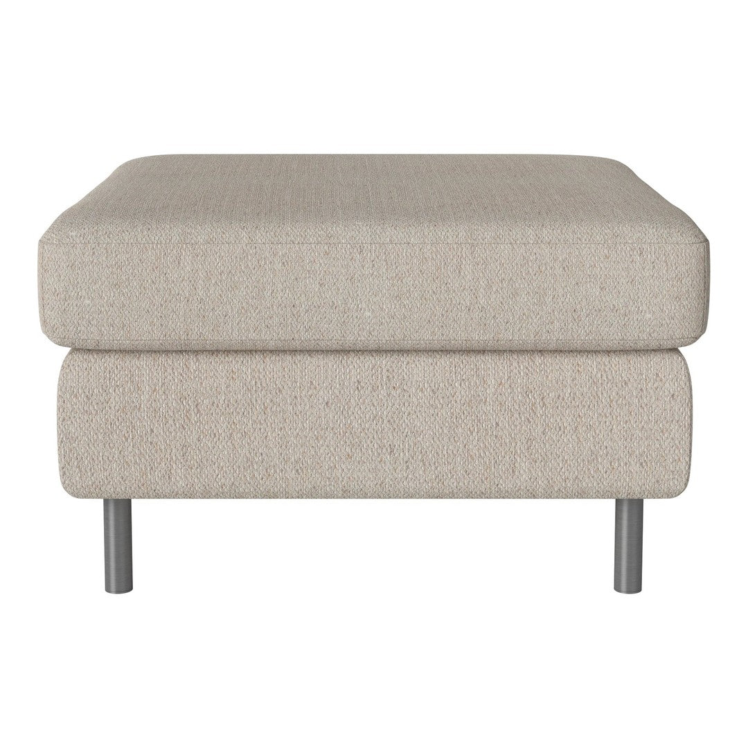 Beige textured ottoman with a minimalist design and sleek metal legs, adding elegance to any space.