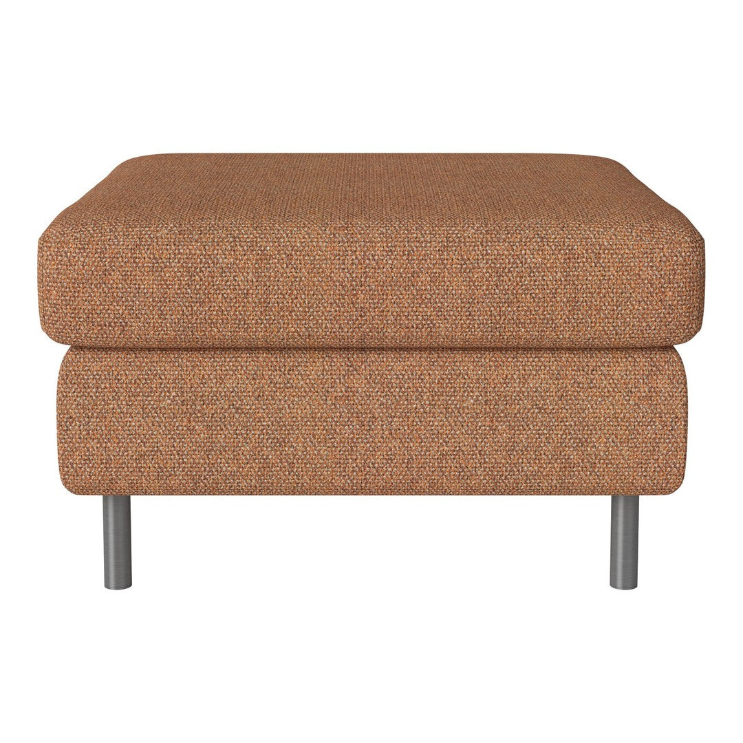 Textured orange ottoman with a soft finish and silver legs, ideal for stylish home decor.