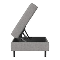 Gray upholstered storage bed with a simple, modern design and a clean, minimalist aesthetic.