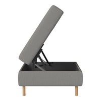 Gray fabric storage bed with a sleek design and natural wood legs, featuring a minimalist style and modern aesthetic.