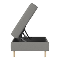 Gray upholstered storage bed with light wood legs and textured fabric pattern, showcasing modern minimalist design.