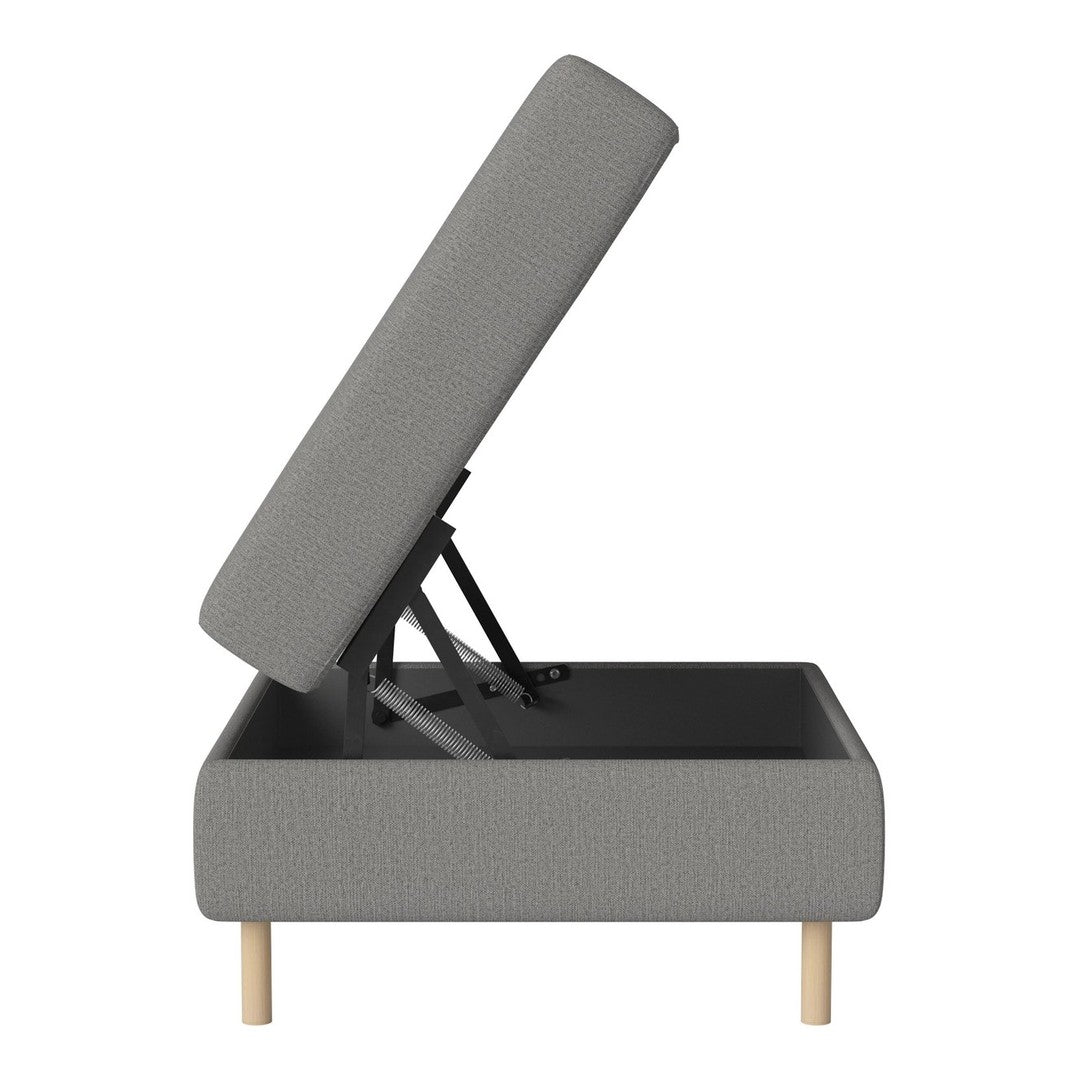 Gray upholstered storage bed with a textured pattern and natural wood legs, showcasing a modern design approach.