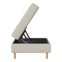 Light gray upholstered ottoman with a minimalist design and natural wood legs, showcasing a clean and modern aesthetic.