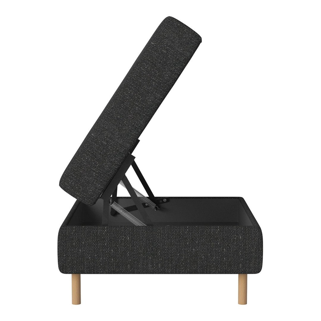 Black fabric storage ottoman with a textured pattern, wooden legs, and a hinged top for easy access.