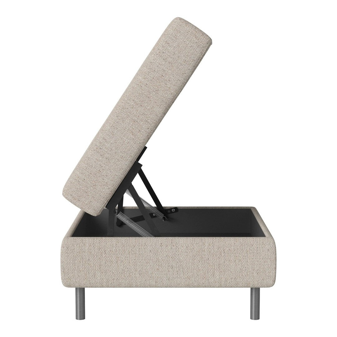 Light beige upholstered storage ottoman with a textured fabric and sleek metal legs, featuring a hinged lid.