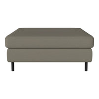 Gray upholstered ottoman with a smooth texture and minimalist design, featuring black metal legs. Perfect for any decor.