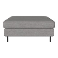 Gray rectangular ottoman with a smooth fabric finish and black metal legs. Simple, modern design without patterns.