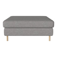 Gray upholstered ottoman with a smooth texture and natural wood legs. Stylish, minimalist design for modern decor.