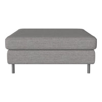 Gray upholstered ottoman with a clean, modern design and subtle texture. Ideal for contemporary living spaces.