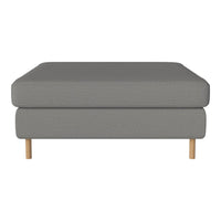 Gray upholstered ottoman with a textured pattern and light wooden legs. Modern and minimalist design for versatile decor.