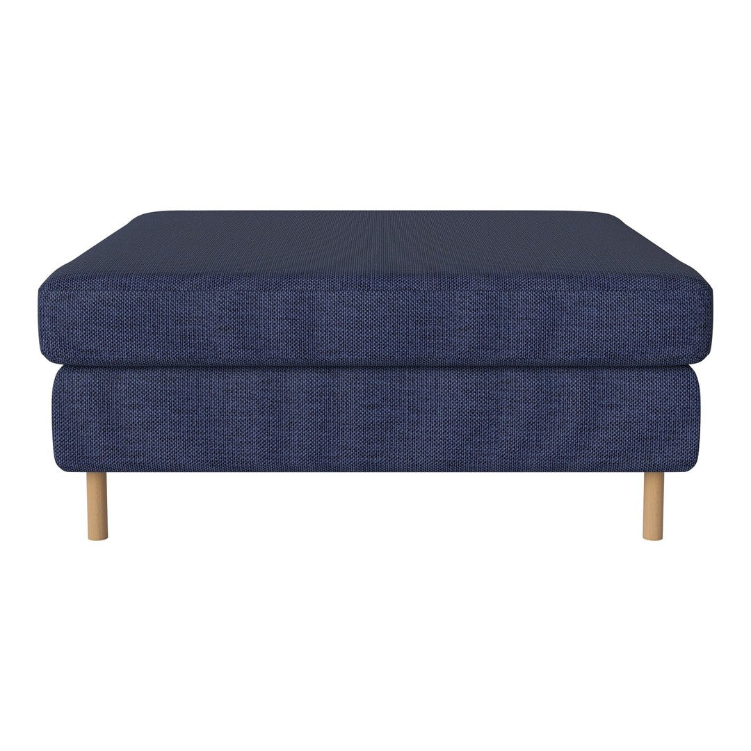 Navy blue upholstered ottoman with a textured pattern and light wood legs for a modern touch.