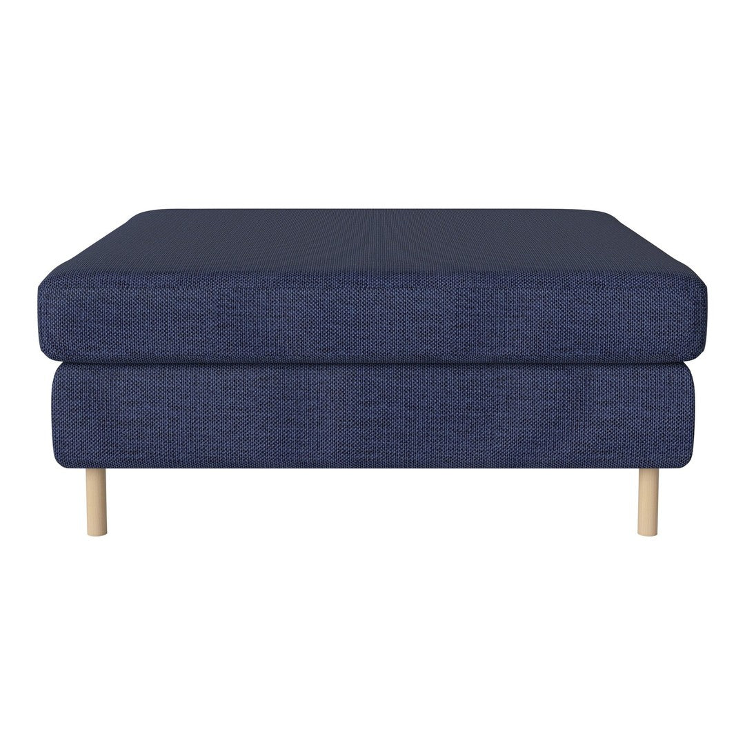 Navy blue upholstered ottoman with a textured fabric and natural wood legs, adding modern elegance to any decor.