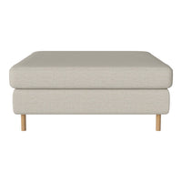 Neutral beige ottoman with a smooth texture and minimalist design, featuring light wood legs. Perfect for modern decor.