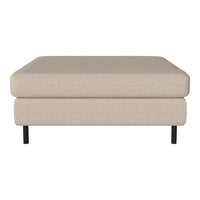 Beige upholstered ottoman with a smooth texture and sleek black legs, perfect for modern decor.