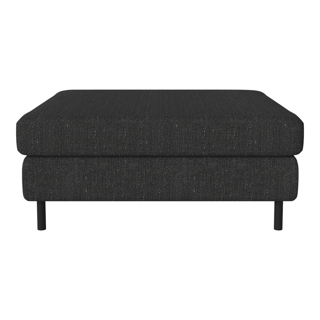 Black fabric ottoman with a sleek, modern design and subtle textured pattern, featuring black legs.