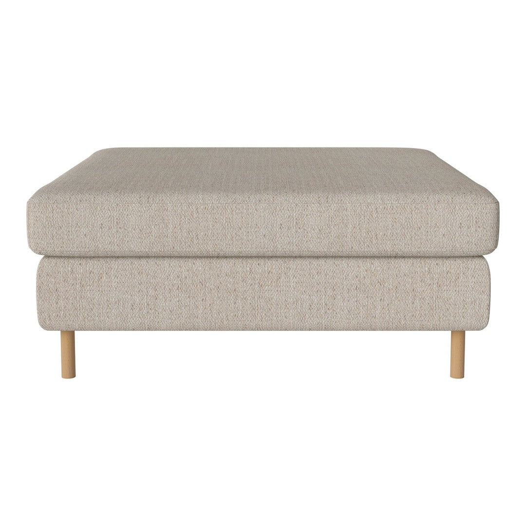 Beige textured ottoman with minimalist design and light wood legs. Ideal for modern and neutral decor styles.