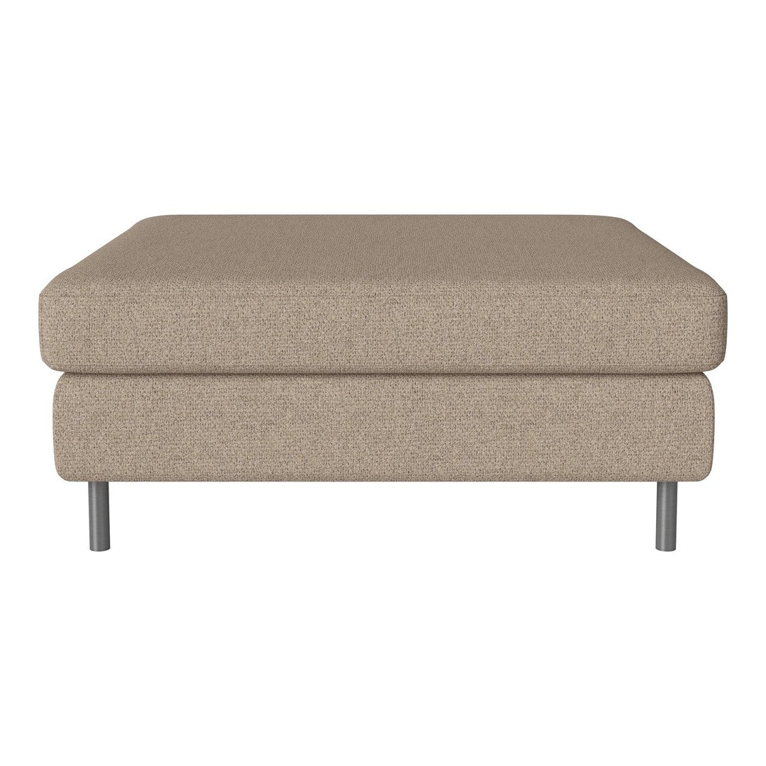 Beige upholstered ottoman with a smooth texture and minimalist design, featuring sleek metallic legs.