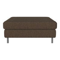 Brown tufted ottoman with a textured fabric finish and sleek silver legs. Perfect for modern decor.