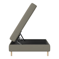 Grey upholstered storage bed with minimalist design, featuring a sleek fabric surface and light wooden legs.