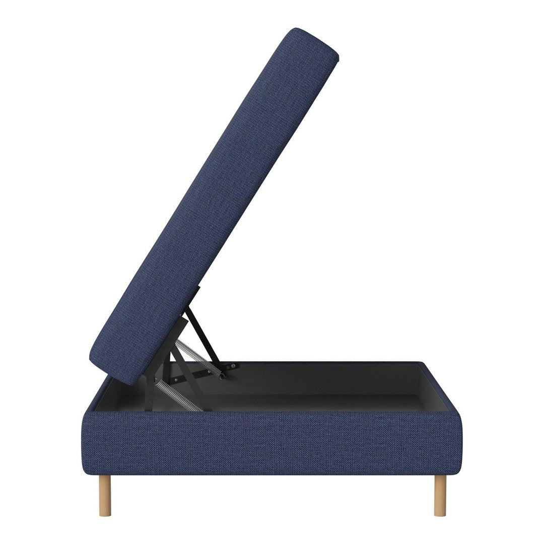 Navy blue upholstered storage bed with textured pattern and wooden legs, partially opened to reveal storage space.