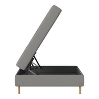 Grey upholstered storage bench with a sleek, minimalist design and natural wood legs. Ideal for modern decor.