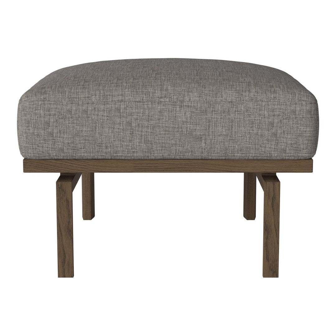 Gray upholstered ottoman with a textured fabric and a simple wooden frame. Modern and versatile design for any decor.