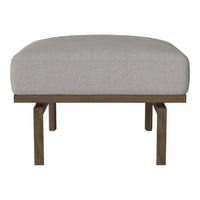 Gray upholstered ottoman with a minimalist design and dark wood legs. Simple and modern home decor accent.