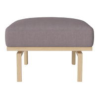 Purple upholstered ottoman with a minimalist wooden frame, showcasing a sleek, modern design. Perfect for any decor.