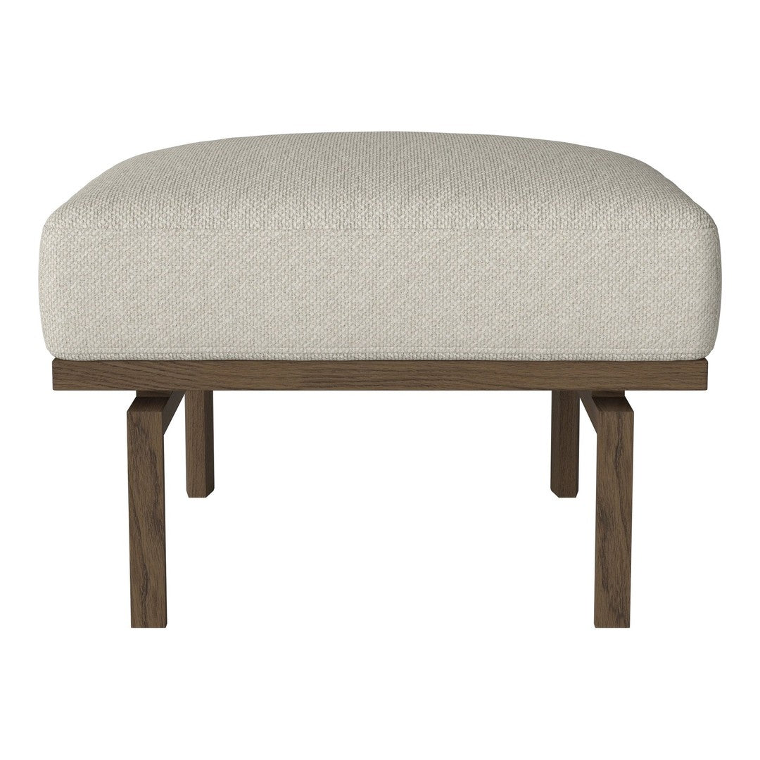 Cream-colored upholstered ottoman with a minimalist wood base. Simple, modern design, ideal for any decor.
