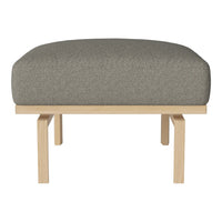 Gray upholstered ottoman with a smooth, rounded top and light wooden legs, perfect for adding a modern touch.