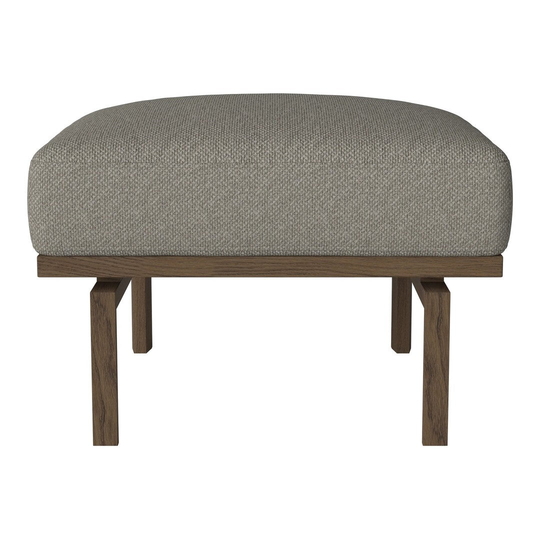 Gray upholstered ottoman with a smooth texture and natural wood legs, offering a modern, minimalist design.