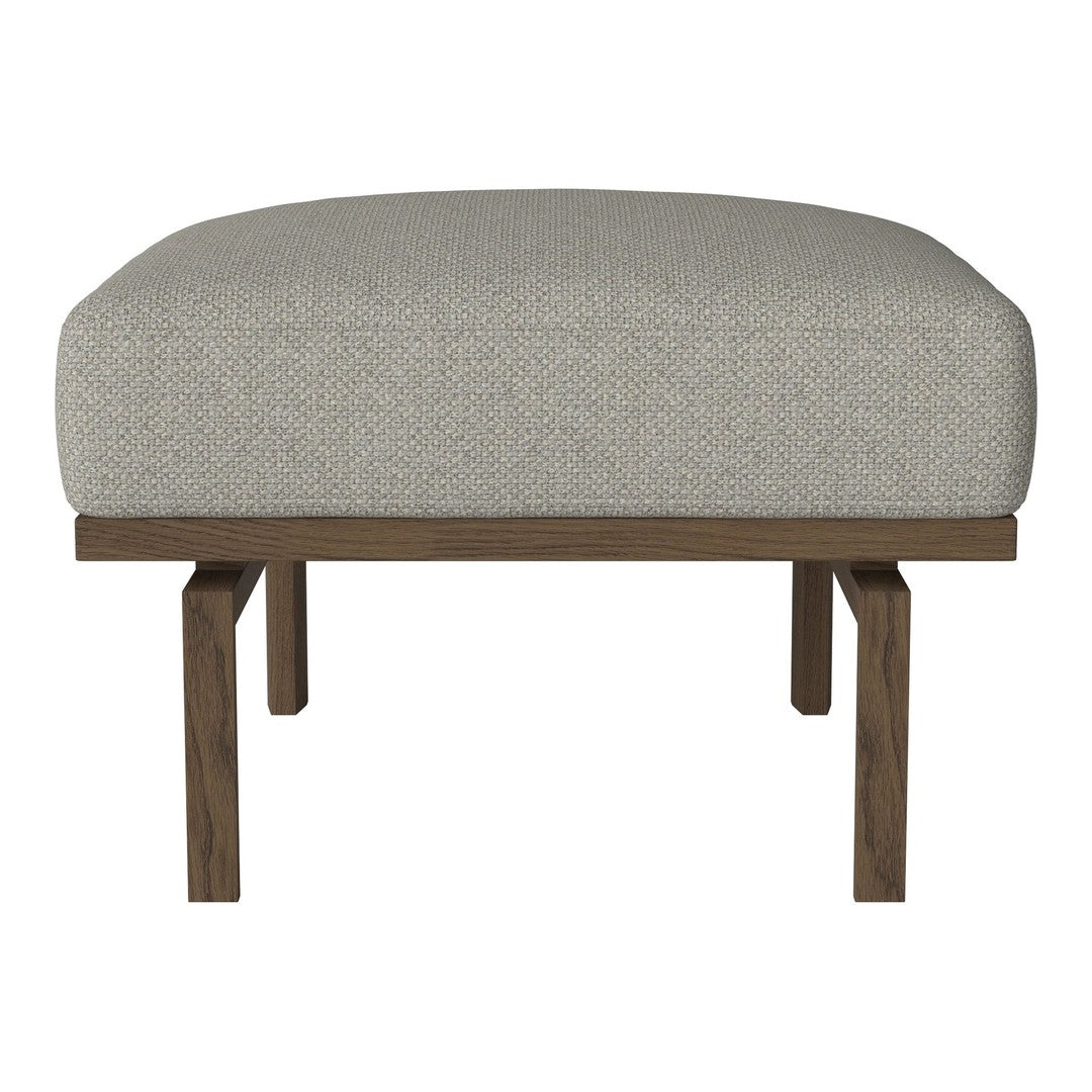 Light gray upholstery with subtle texture, featuring a rectangular design and dark wooden legs. Ideal for modern decor.