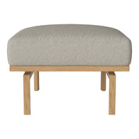 Light gray cushioned ottoman with a natural wood frame, featuring a simple, modern design perfect for any decor.