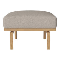 Beige upholstered ottoman with a textured fabric top and natural wood legs, perfect for modern decor.