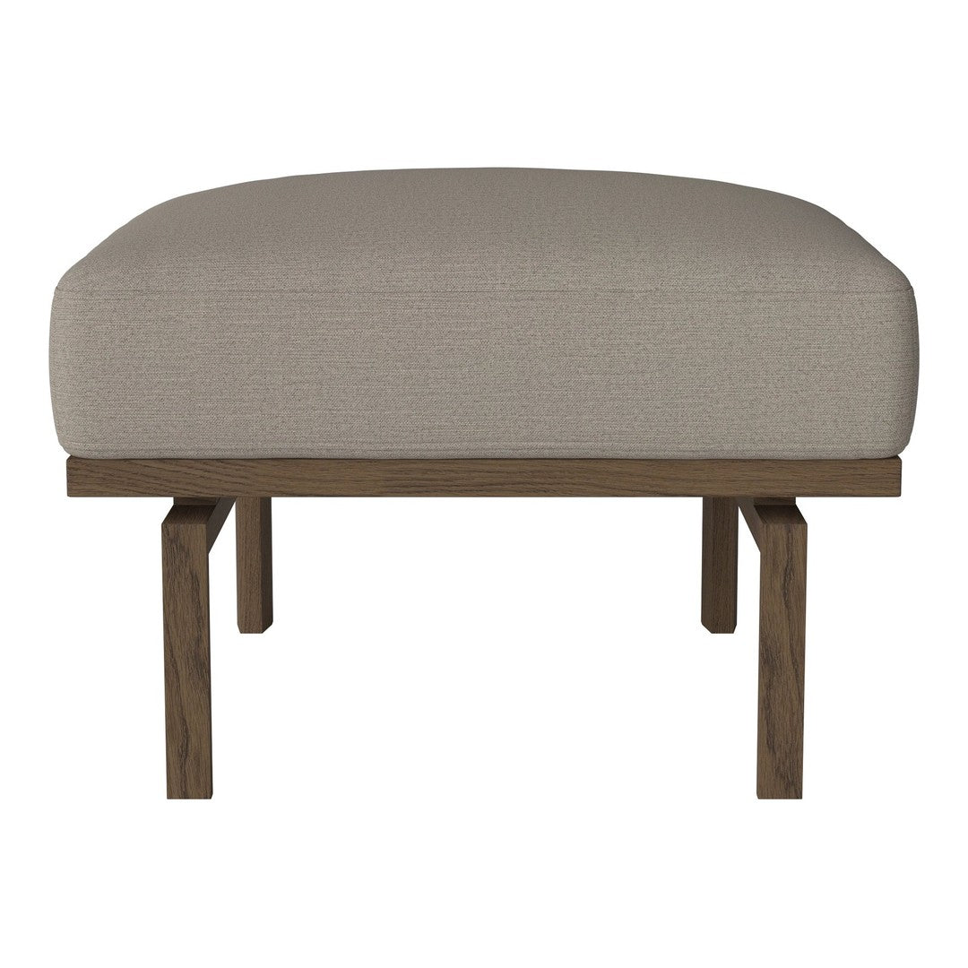 Beige upholstered ottoman with a smooth surface and dark wooden legs, featuring a simple and modern design.
