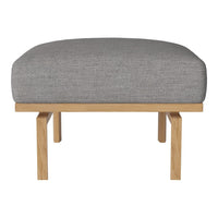 Gray upholstered ottoman with a smooth texture and natural wood legs, featuring a minimalist design.