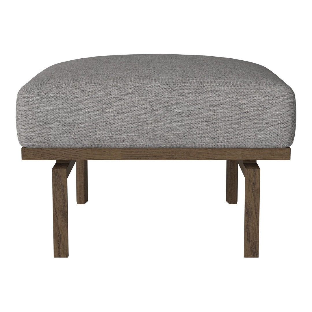 Gray upholstered ottoman with a smooth texture and natural wood legs, perfect for modern or minimalist decor.