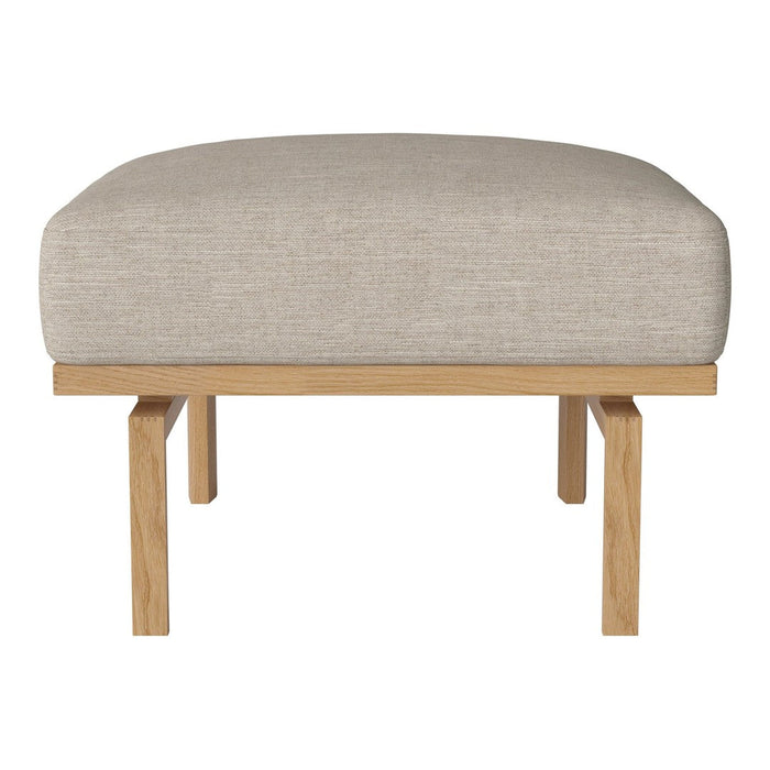 Neutral beige upholstered ottoman with a minimalist wooden frame. Soft texture and simple design for versatile decor.