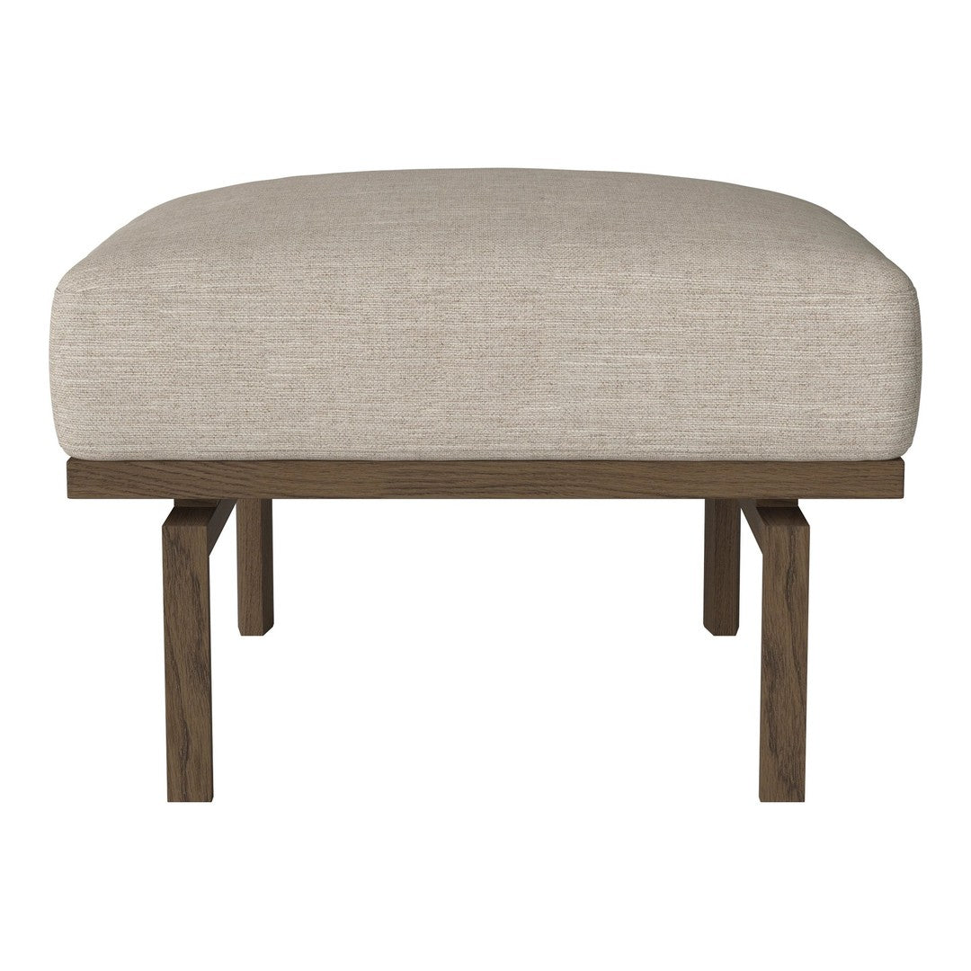 Beige upholstered ottoman with a smooth texture and dark wooden legs, featuring a minimalist design.