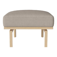 Light beige ottoman with a smooth fabric cushion and simple wooden frame, ideal for modern decor.